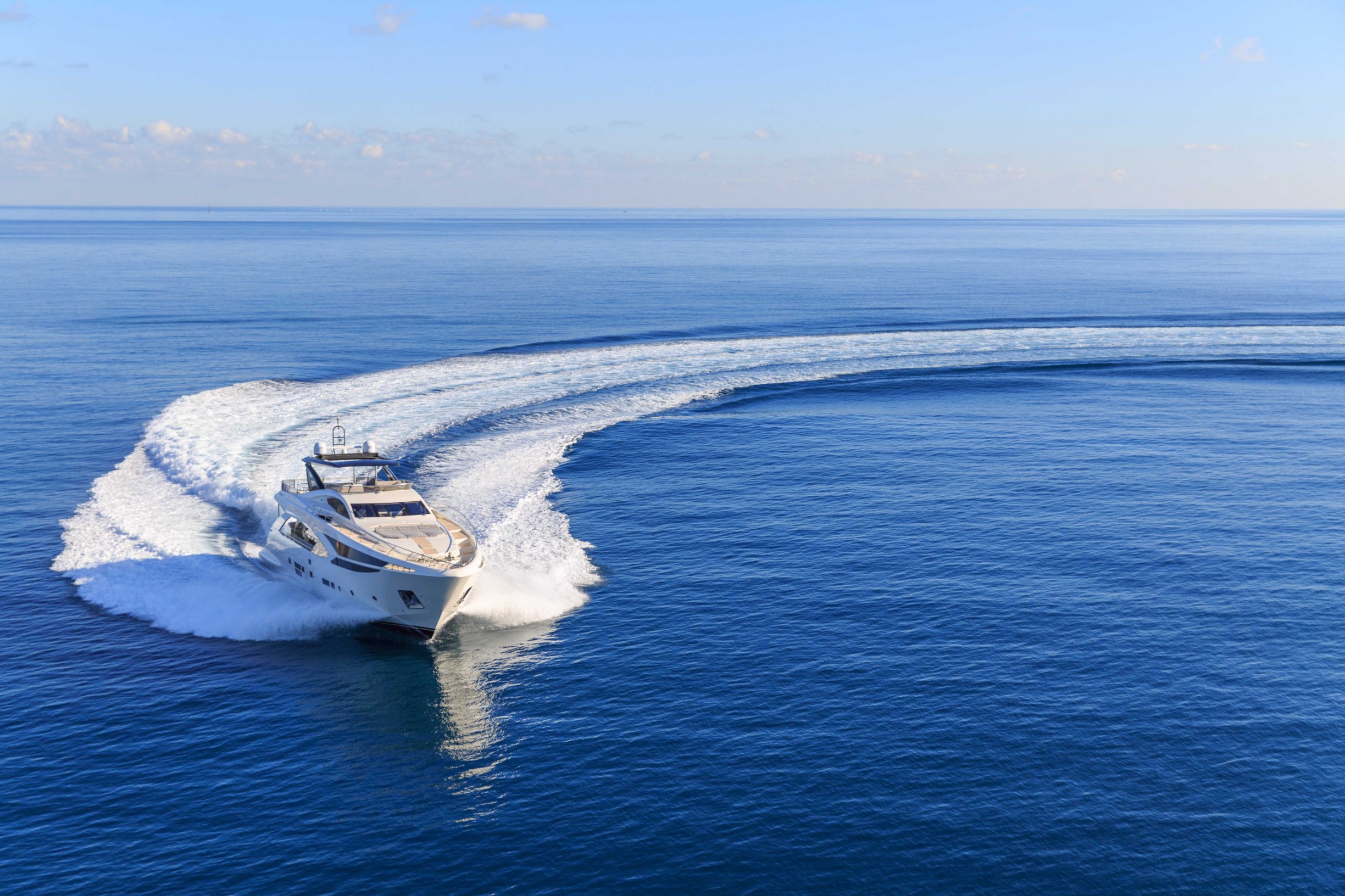 Yacht at sea with waves in water